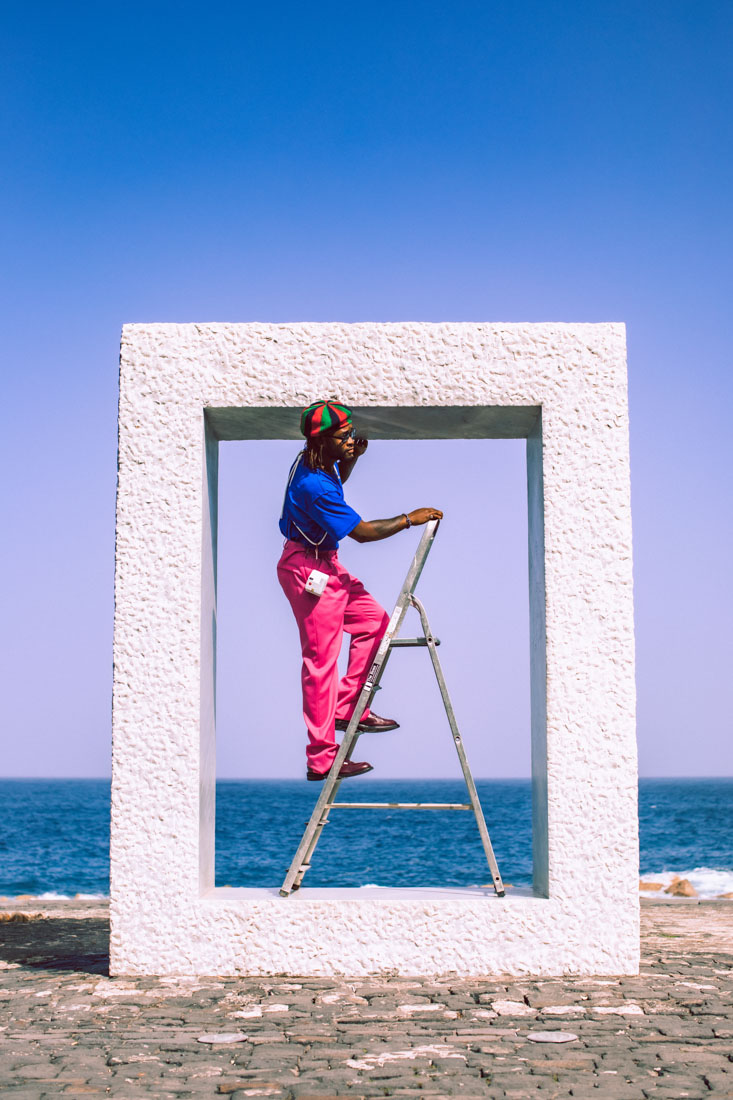 Lifestyle_Shot_Go_Camera_White_Ibby_Ladder_Polaroid_Go_2022_300ppi